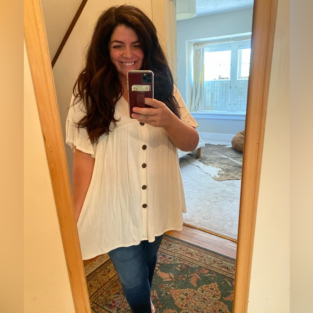 Oversized white top with faux buttons